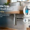 Chrome bottle trap and wall pipe under a floating wash basin vanity in a bathroom